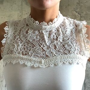 Lace detailed off-white top